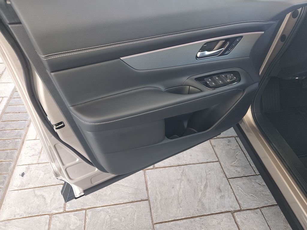 New 2026 Champagne Silver Metallic Nissan SL AWD image 24