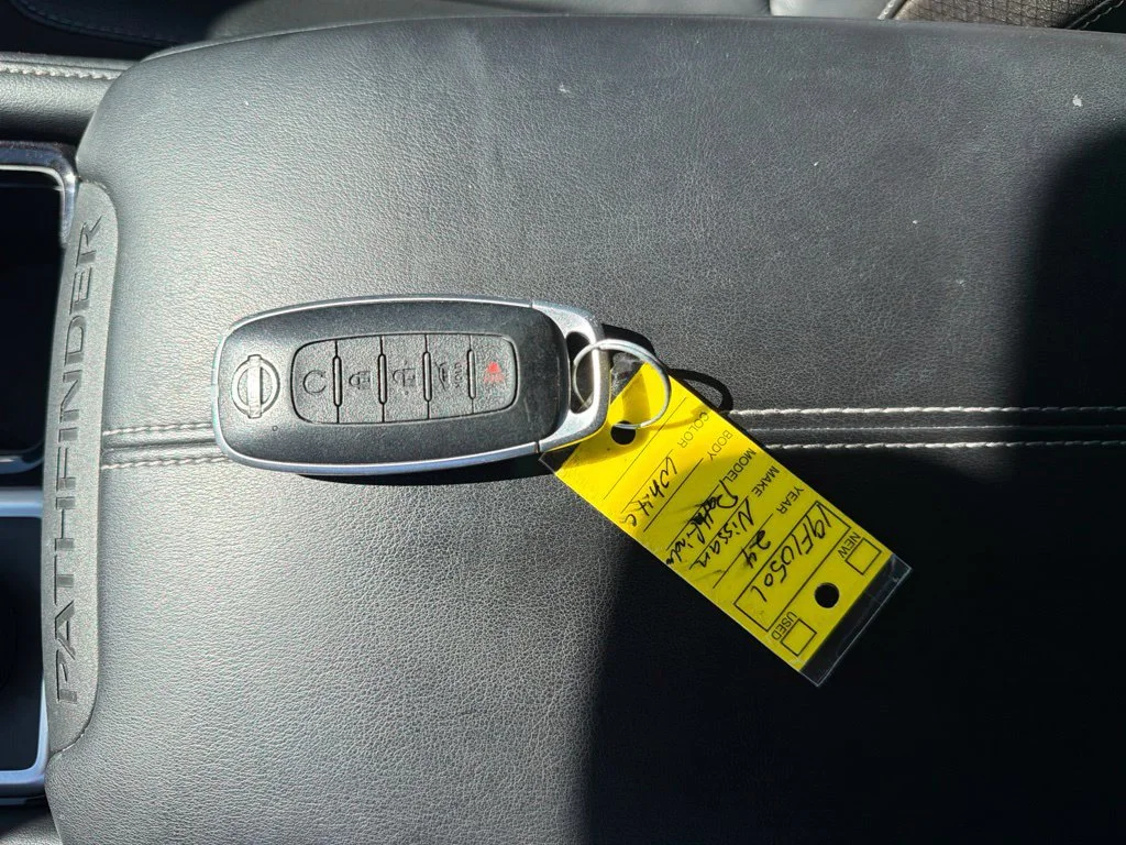 Used 2024 Pearl White Tricoat/Super Black Nissan SL image 2