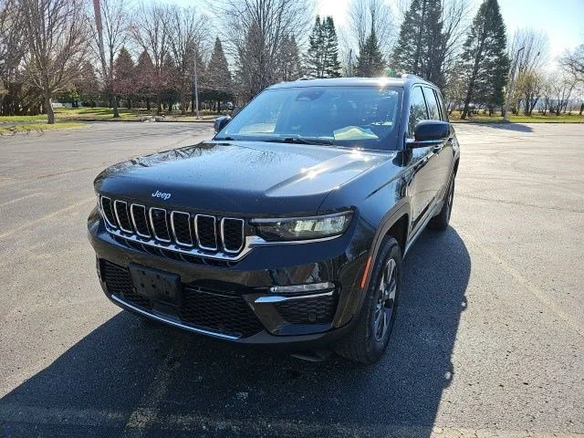 Certified 2022 Jeep Grand Cherokee 4xe with VIN 1C4RJYB63N8707106 for sale in Urbandale, IA