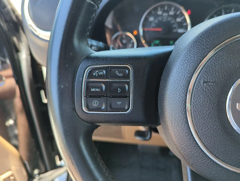 Used 2014 Black Jeep Unlimited Sahara image 21