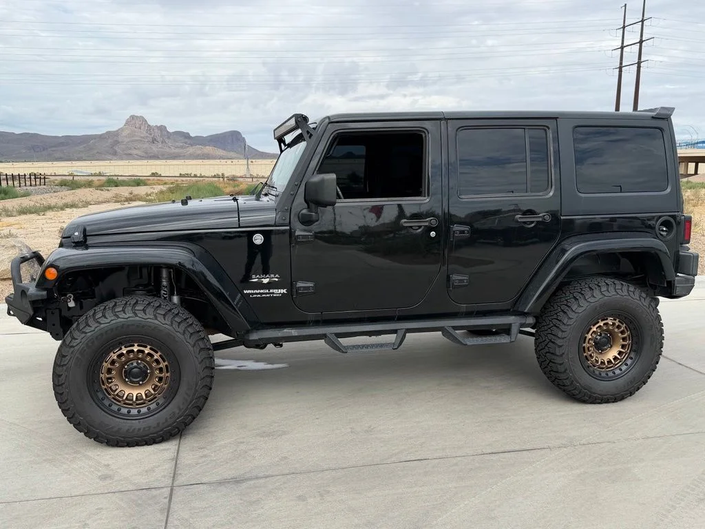 Used 2018 Black Jeep Unlimited Sahara image 5