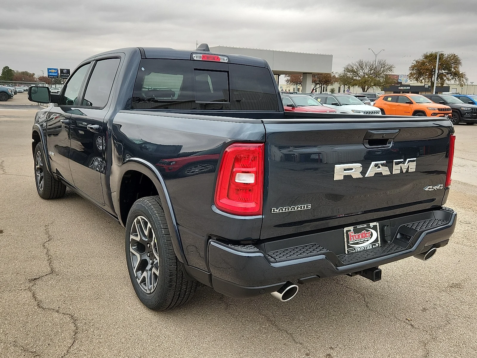 New 2026 Forged Blue Metallic  Paint Ram LARAMIE CREW CAB 4X4 5