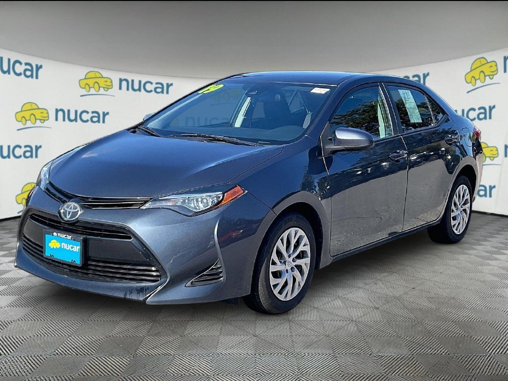 Used 2019 Slate Metallic Toyota LE image 3
