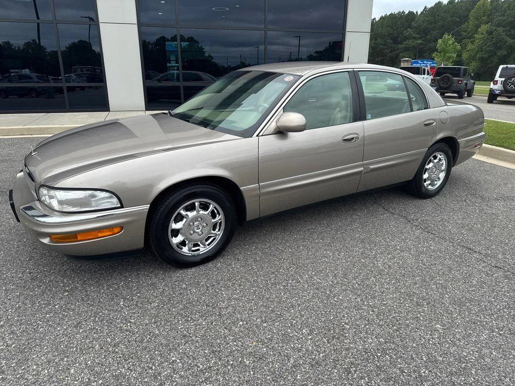 Used 2004 Light Bronzemist Metallic Buick 4dr Sdn image 1