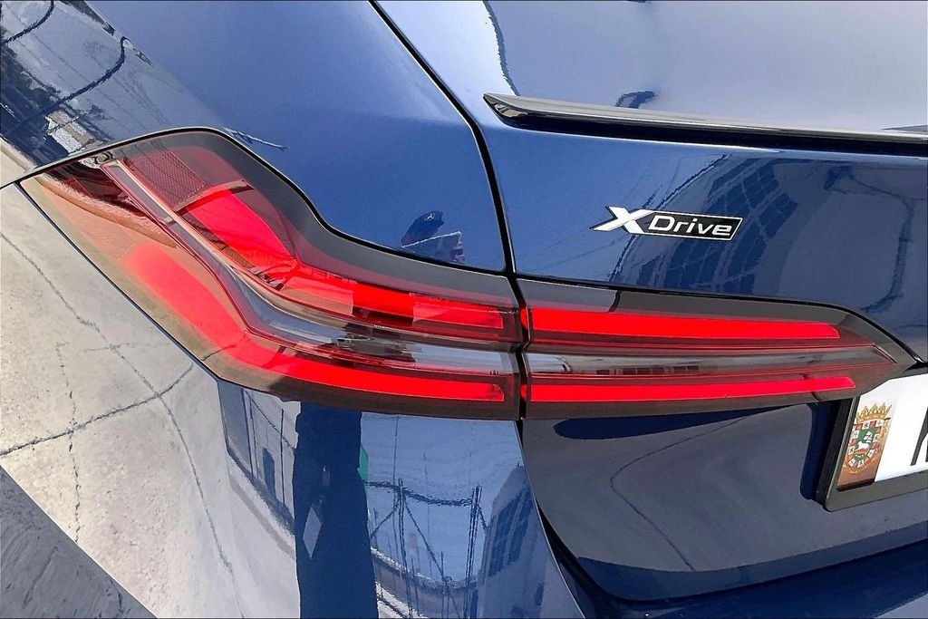 Used 2026 Blue BMW 550e xDrive image 26