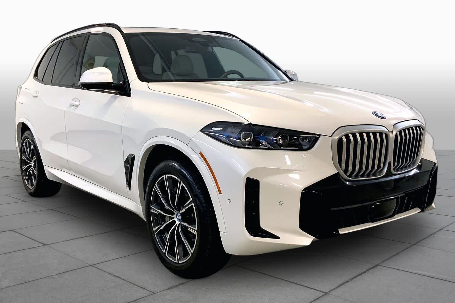 Used 2024 Mineral White Metallic BMW xDrive50e image 2