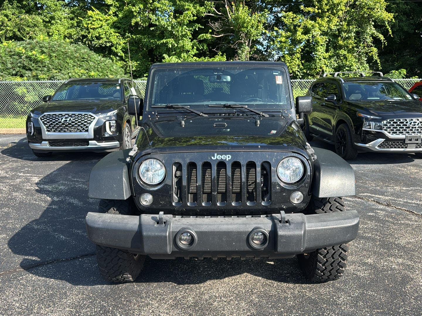 Used 2016 Black Clearcoat Jeep Sport image 8