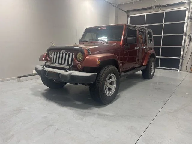 Used 2007 Jeep Wrangler Unlimited Sahara with VIN 1J4GB59107L200252 for sale in Albany, GA