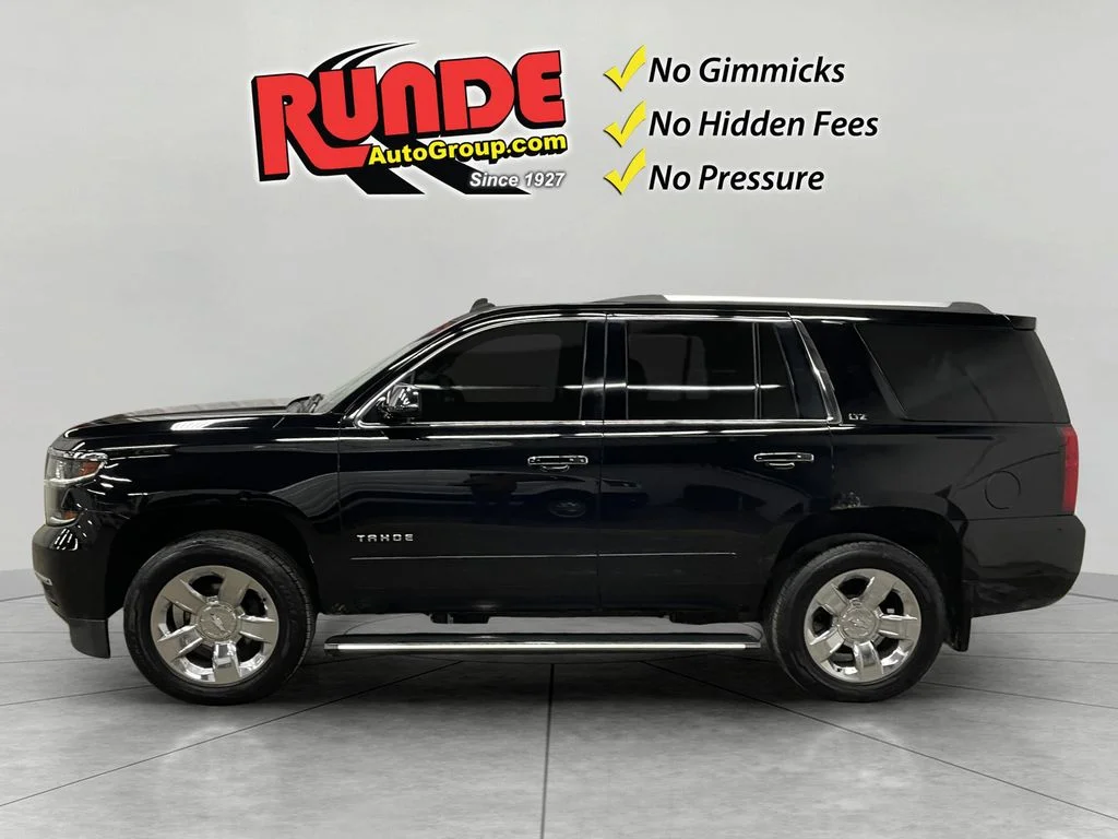 Used 2015 Chevrolet Tahoe LTZ with VIN 1GNSKCKC0FR103068 for sale in Manchester, IA