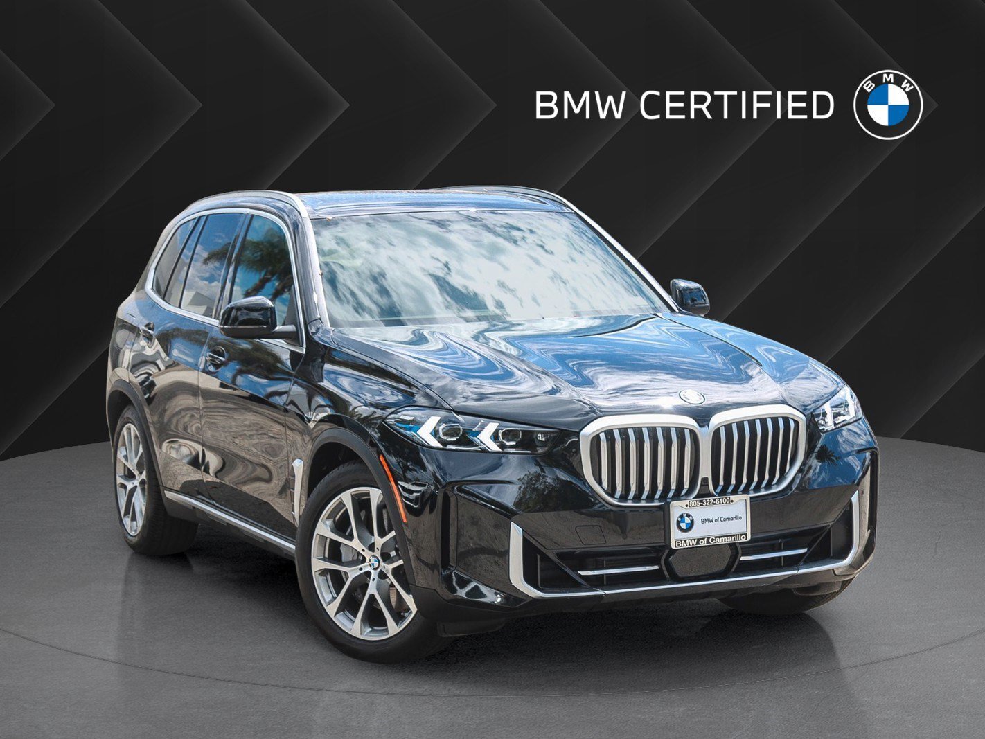 Used 2026 Black Sapphire Metallic BMW xDrive50e image 1