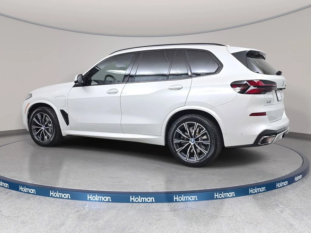 Used 2024 Mineral White Metallic BMW xDrive50e image 7