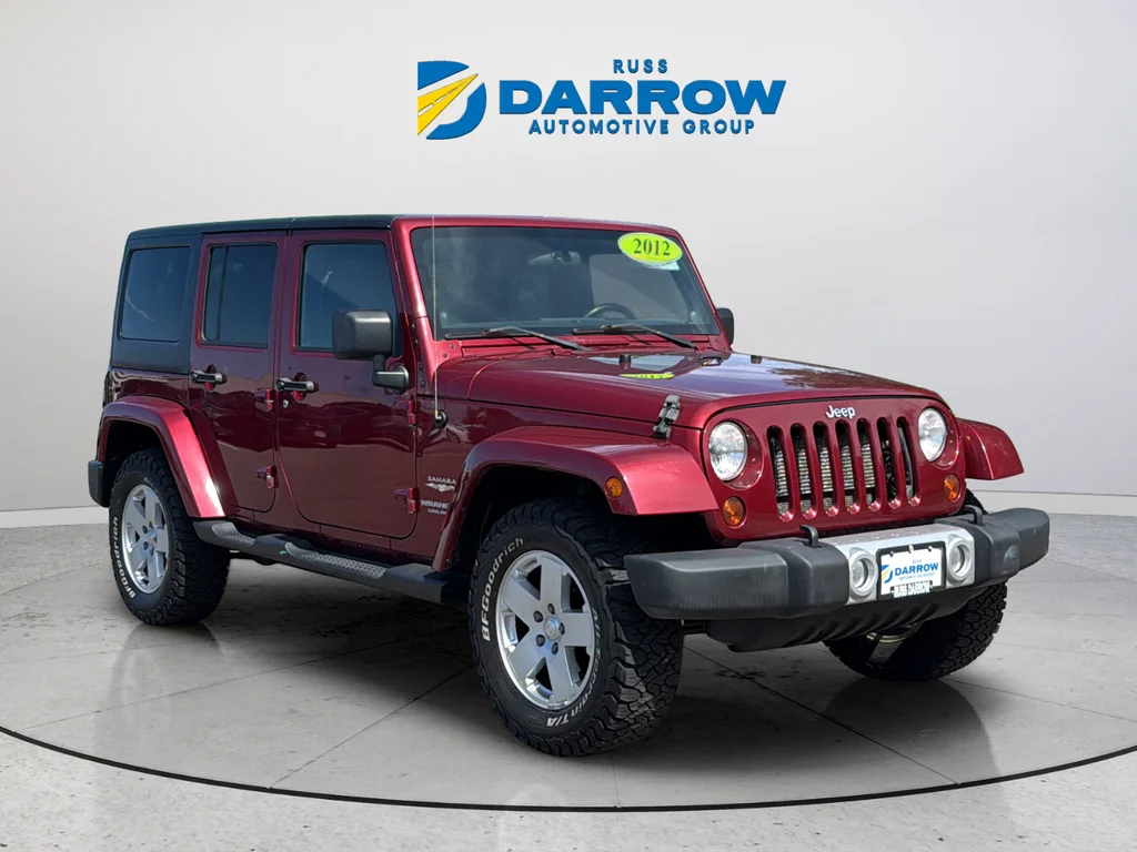 Used 2012 Red Jeep Unlimited Sahara image 7