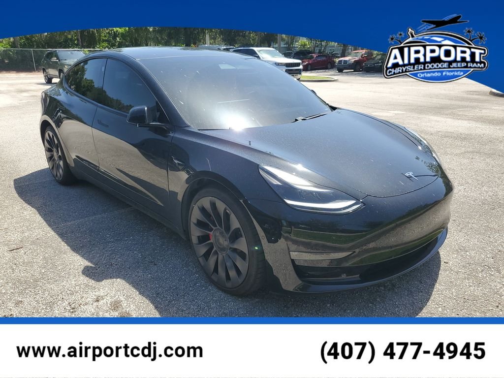 Used 2021 Black Tesla Performance image 1