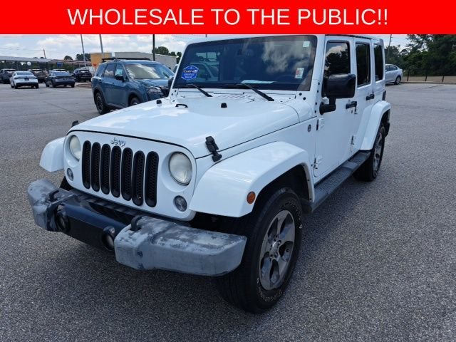 Used 2014 White Jeep Unlimited Sahara image 2