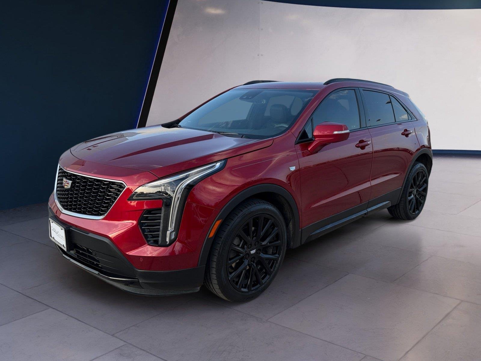 Used 2023 Radiant Red Tintcoat Cadillac FWD Sport image 1