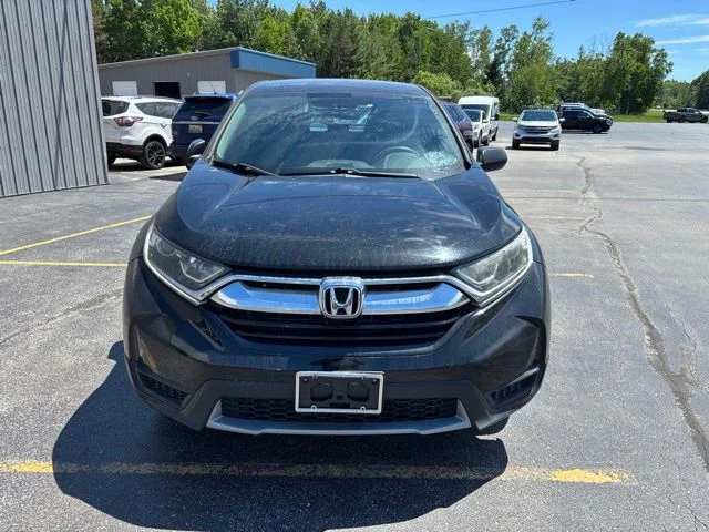 Used 2017 Honda CR-V LX with VIN 2HKRW6H36HH216750 for sale in Manistee, MI