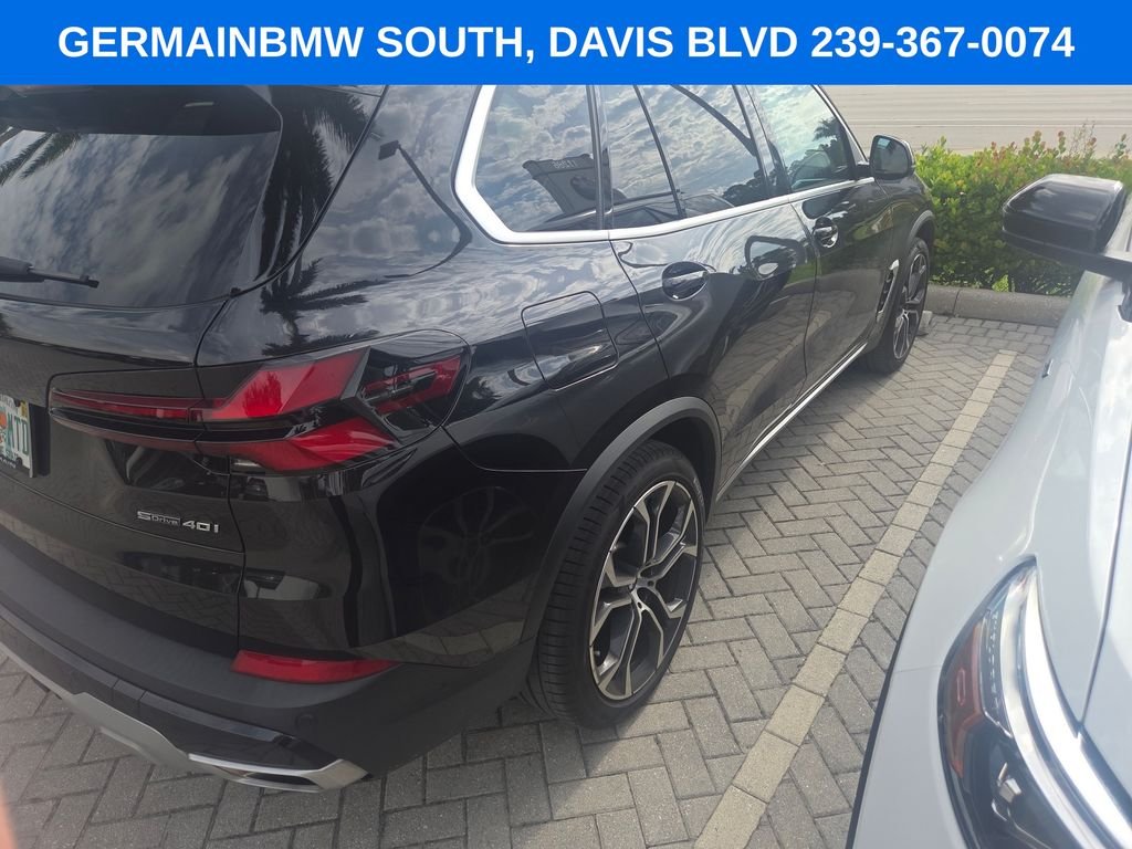 Certified Used 2024 Black Sapphire Metallic BMW sDrive40i image 13