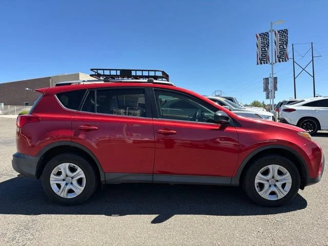 Used 2013 Barcelona Red Metallic Toyota LE image 4