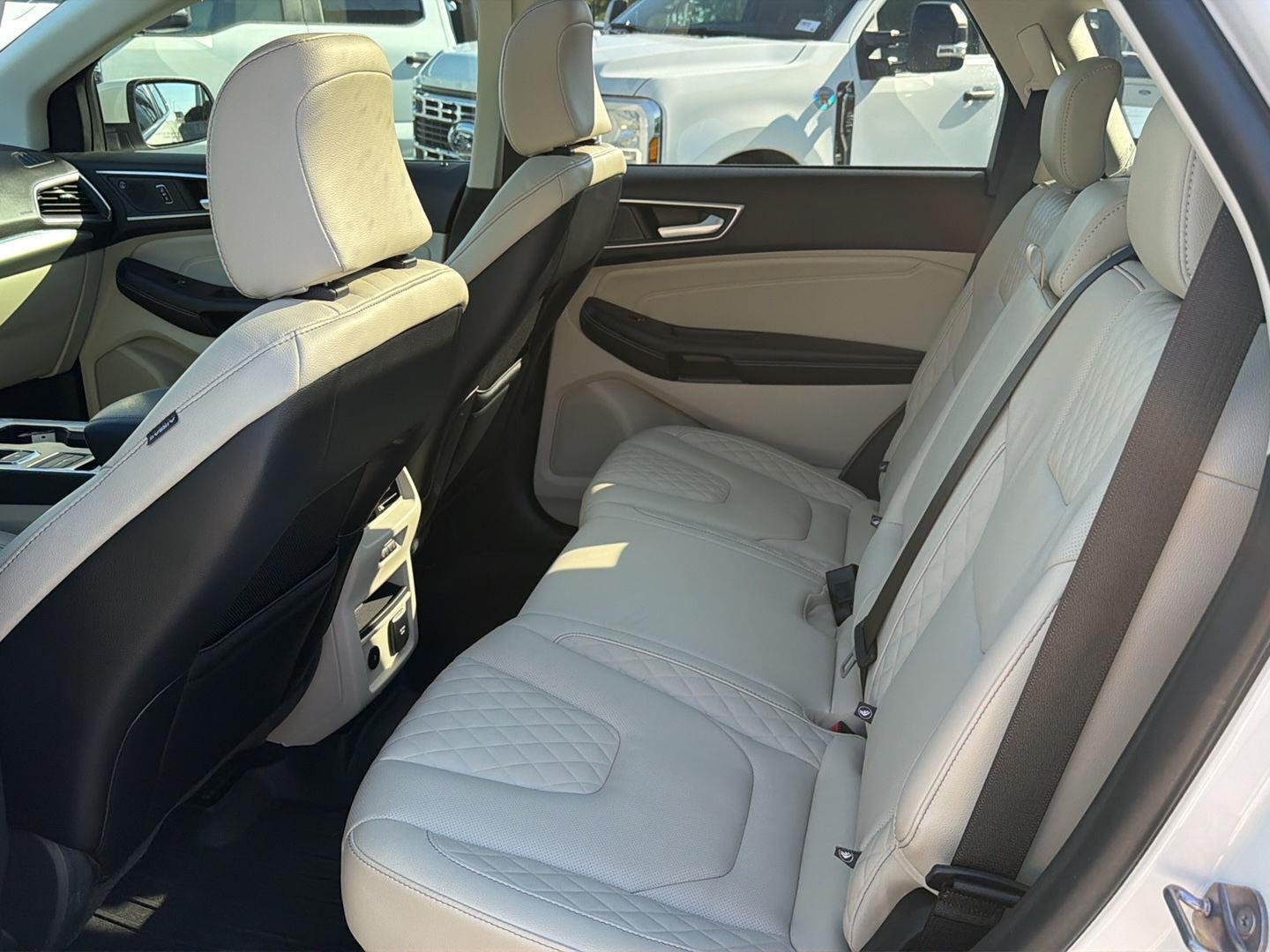 Used 2024 Star White Metallic Tri-Coat Ford Titanium image 11