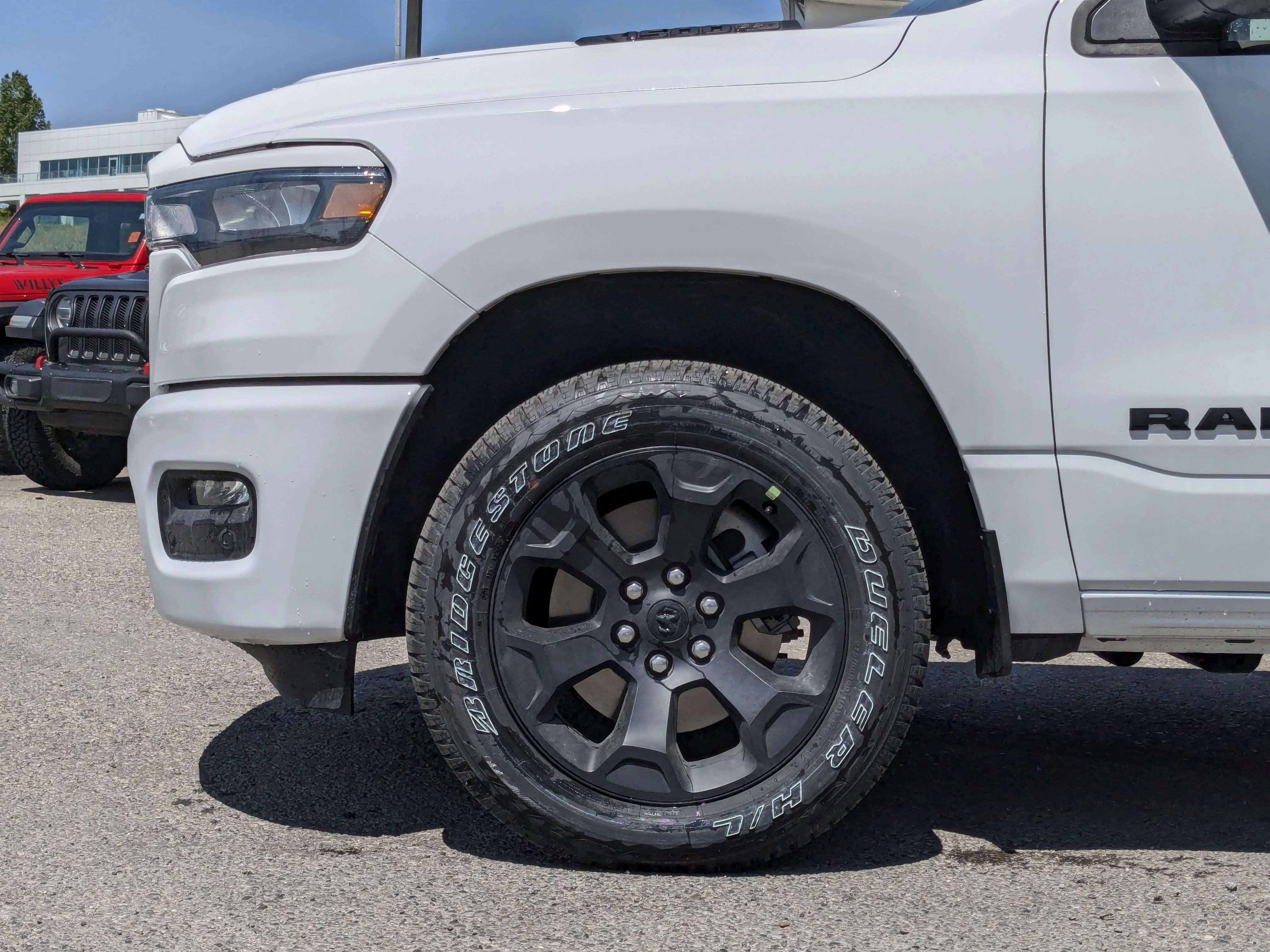New 2026 White RAM Sport - 3.92 Rear Axle Ratio - Anti Spin Rear Diff - Sport Hood - Panoramic Sunroof & Tons More! image 8
