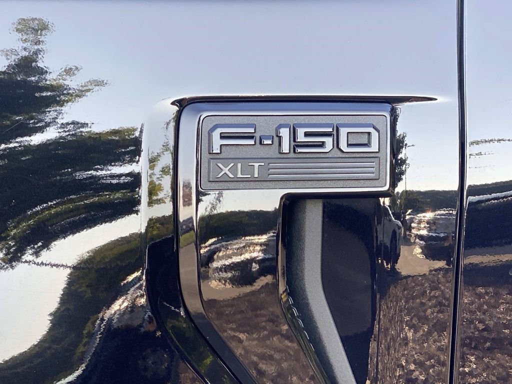 Used 2025 Agate Black Metallic Ford STX image 11