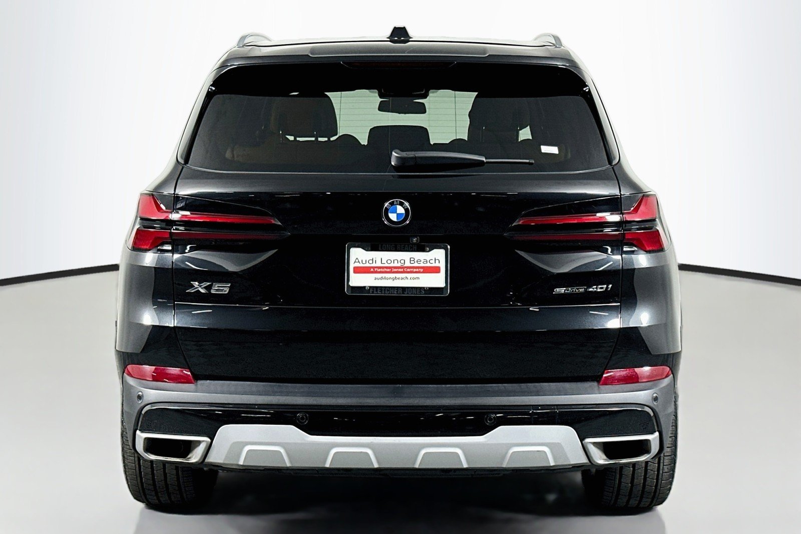 Used 2024 Black Sapphire Metallic BMW sDrive40i image 3