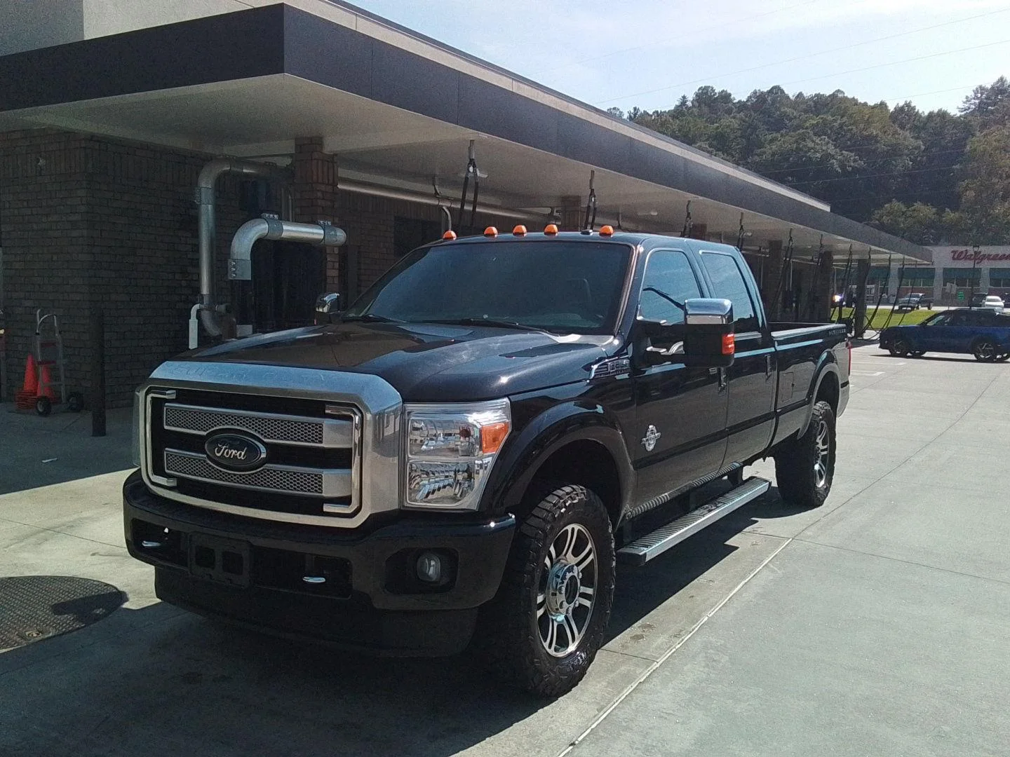 Used 2015 Tuxedo Black Metallic Ford Platinum image 1