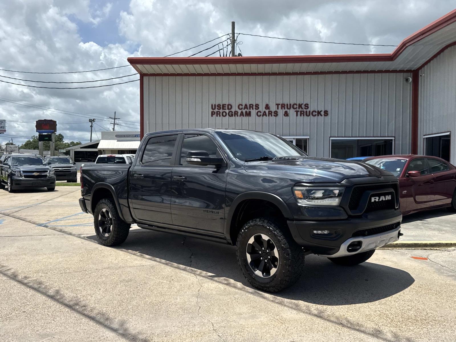 Used 2021 Maximum Steel Metallic Clearcoat Ram Rebel image 1
