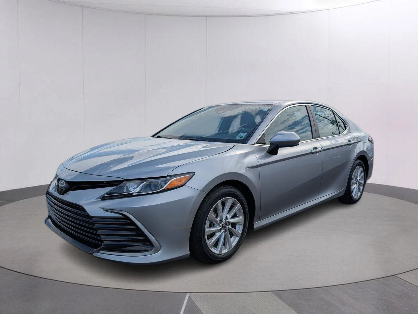 Used 2024 Celestial Silver Metallic Toyota LE image 1