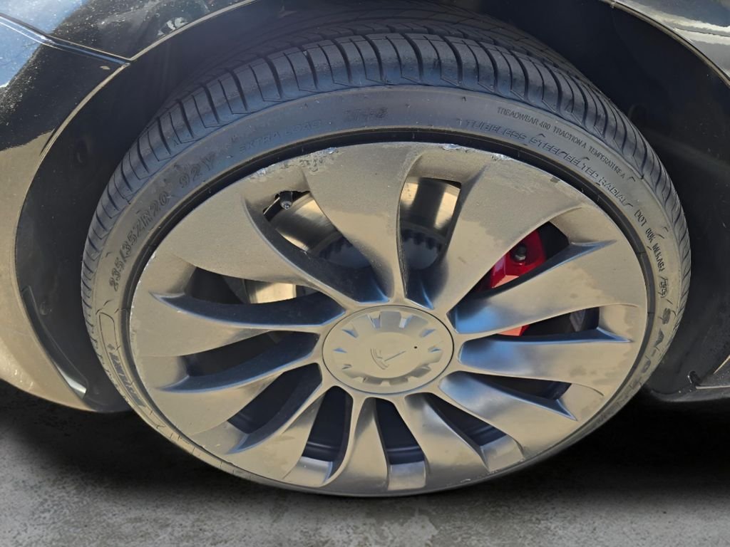 Used 2022 Solid Black Tesla Performance image 18