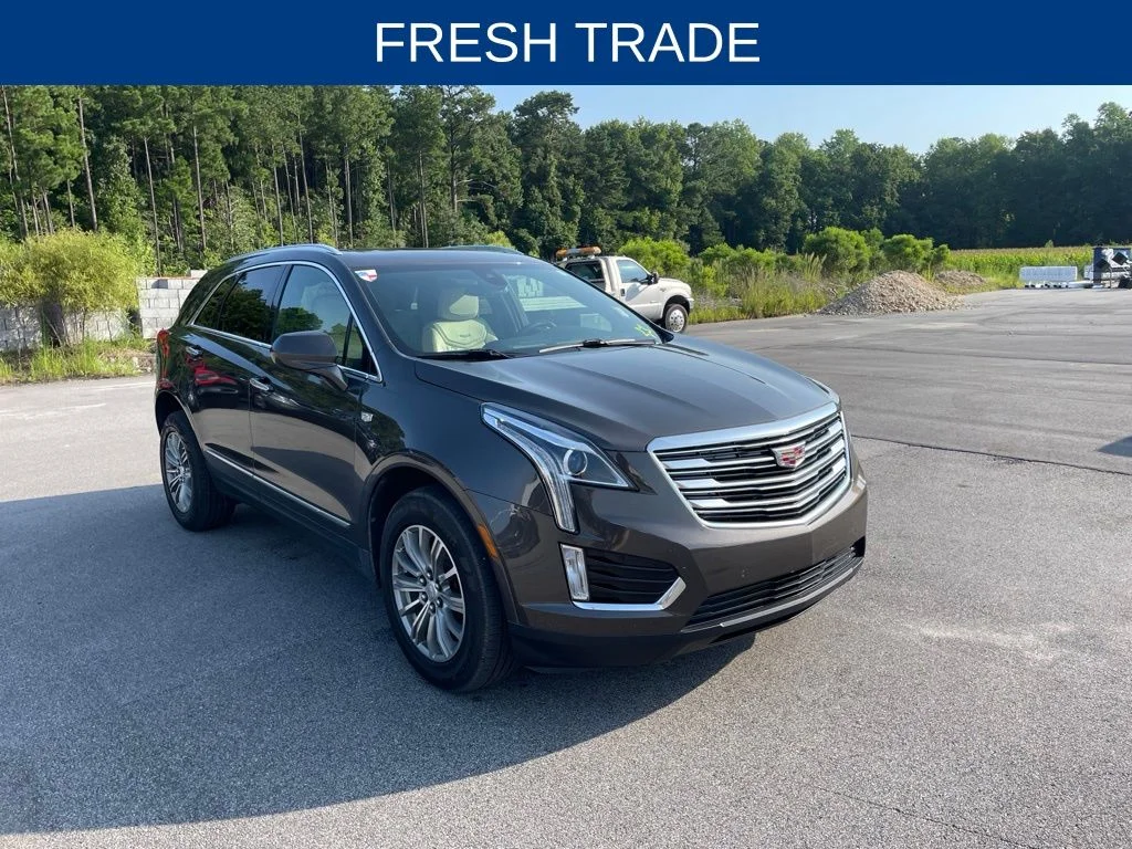 Used 2019 Brown Cadillac Luxury image 1