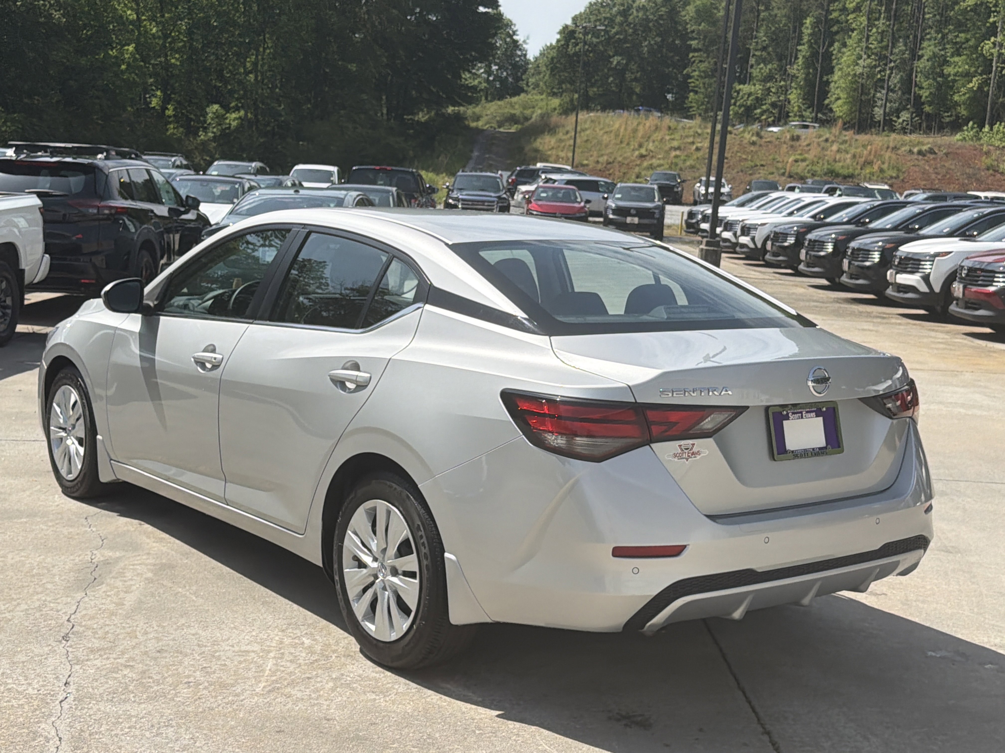 Used 2023 Brilliant Silver Metallic Nissan S image 6
