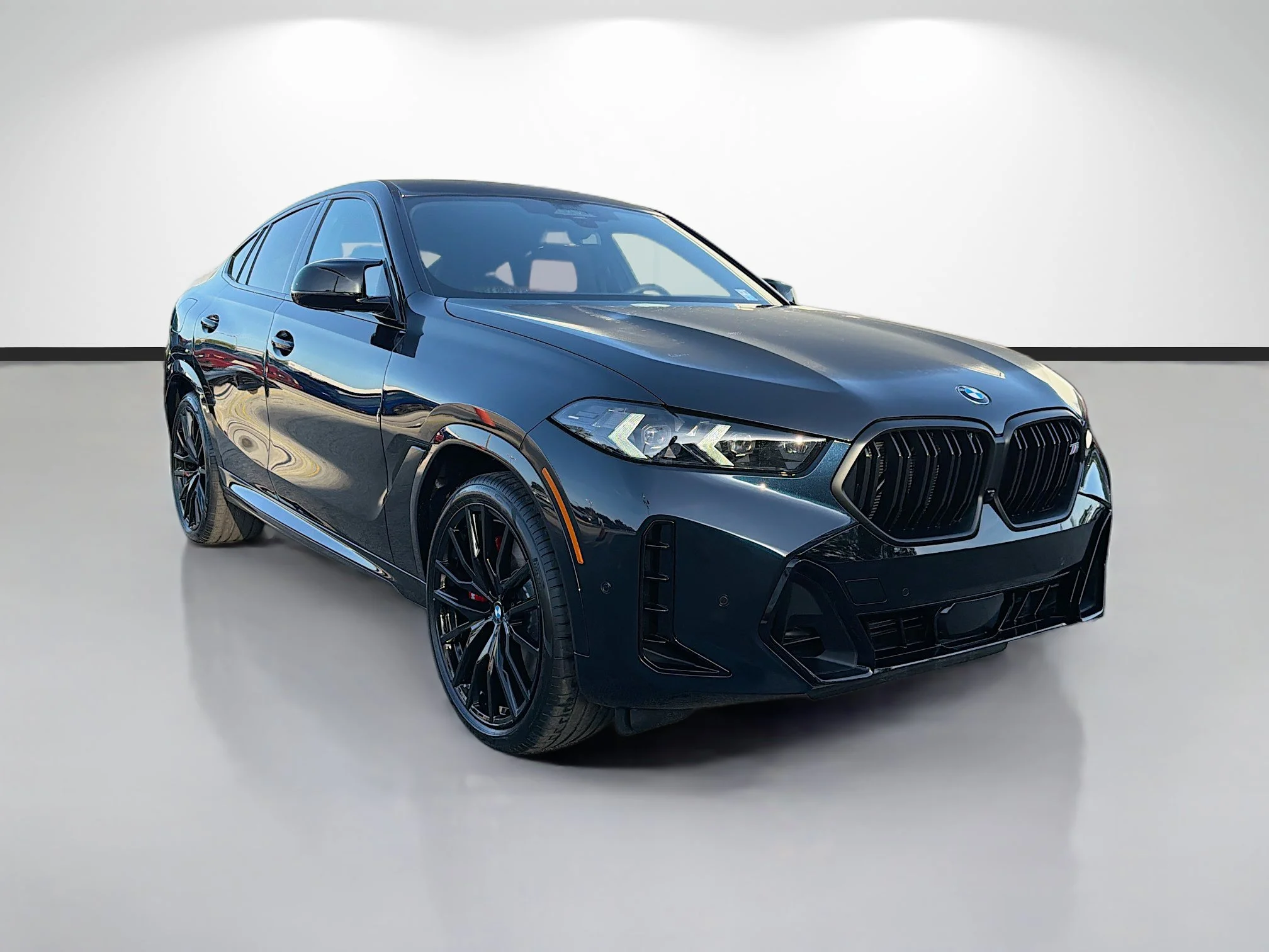 New 2027 Carbon Black Metallic BMW M60i image 1
