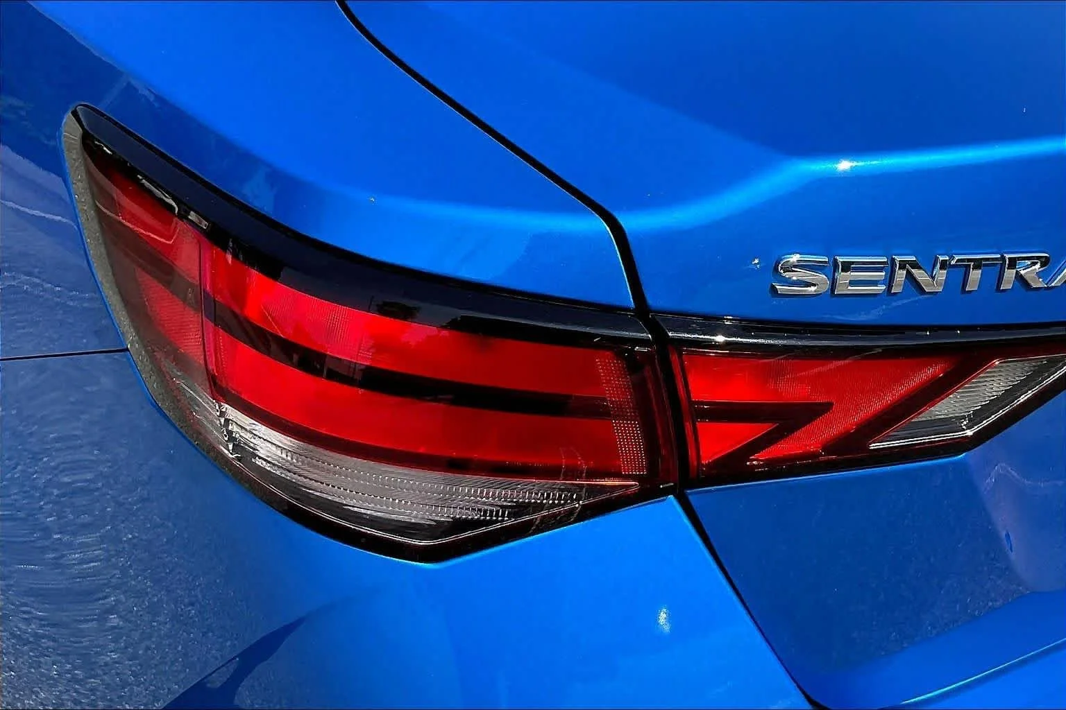 Used 2025 Electric Blue Metallic Nissan SV image 28