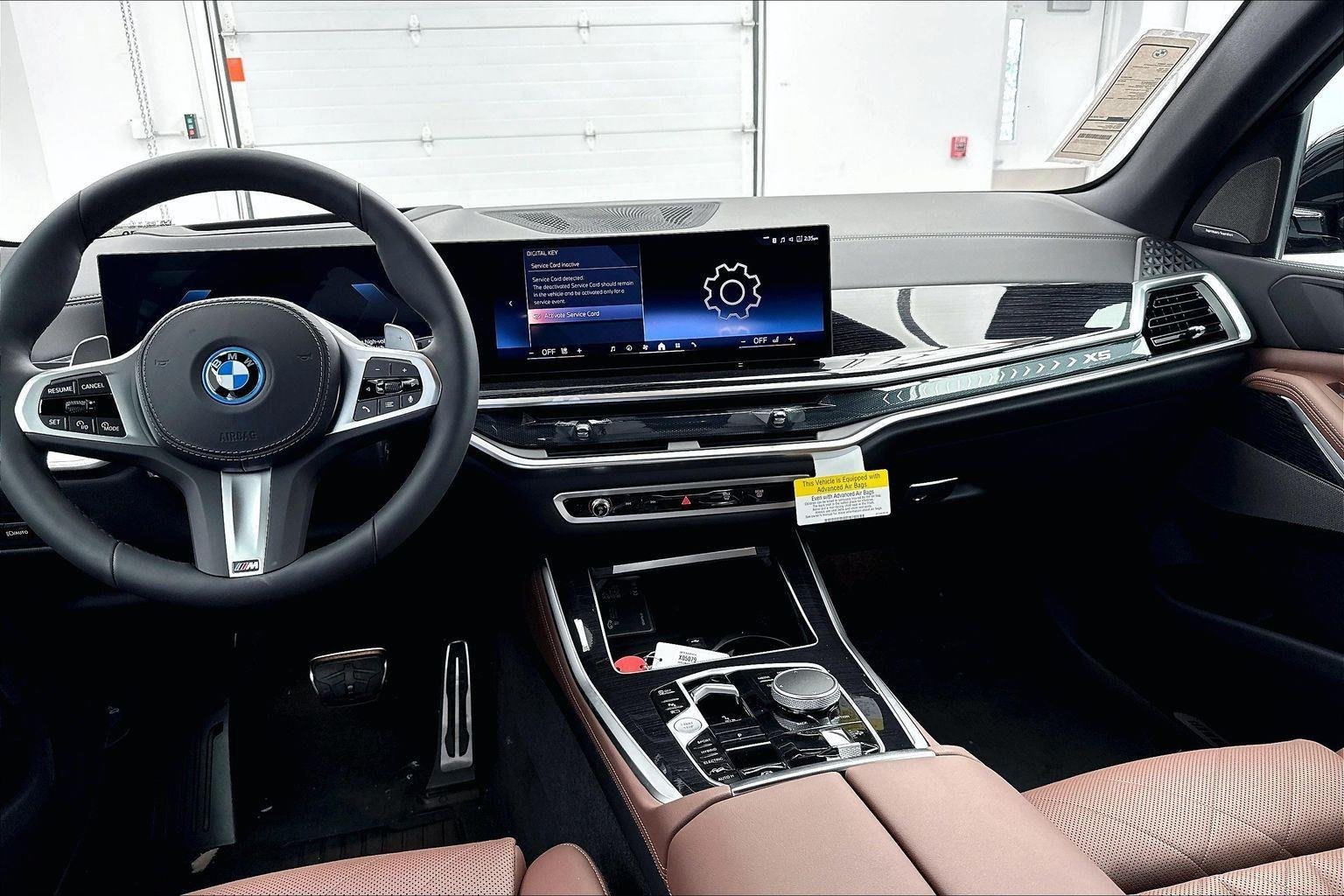 New 2026 Black Sapphire Metallic BMW xDrive50e image 11