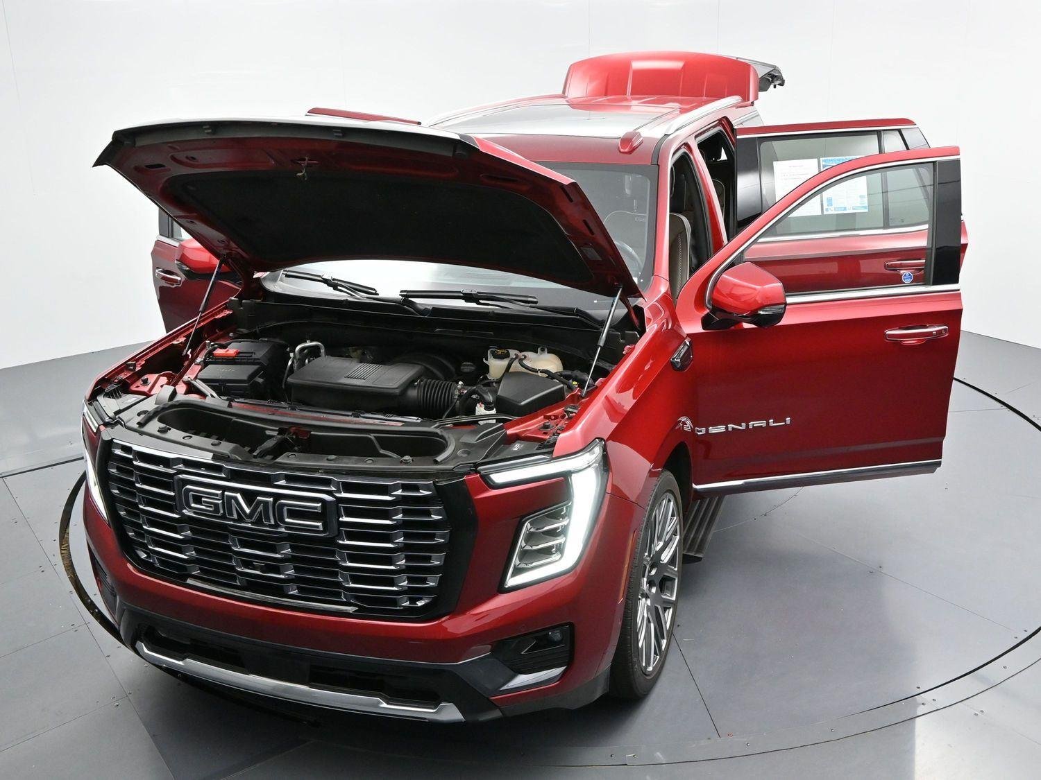 Used 2025 Volcanic Red Tintcoat GMC Denali Ultimate image 54