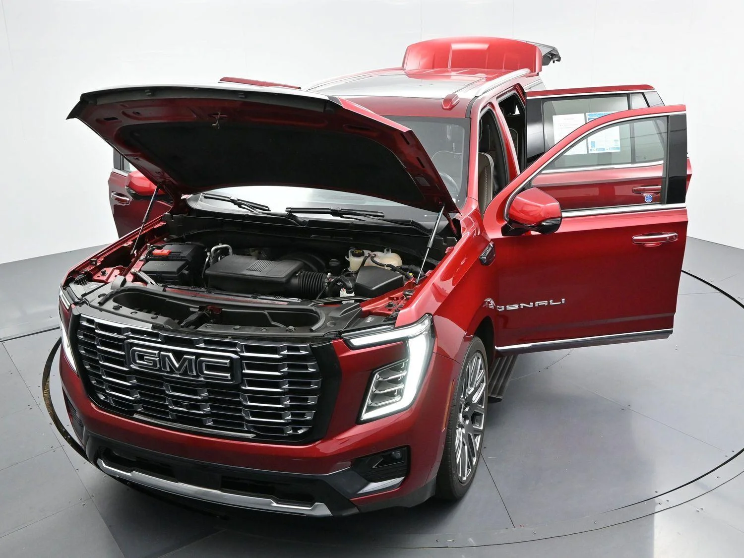 Used 2025 Volcanic Red Tintcoat GMC Denali Ultimate image 54