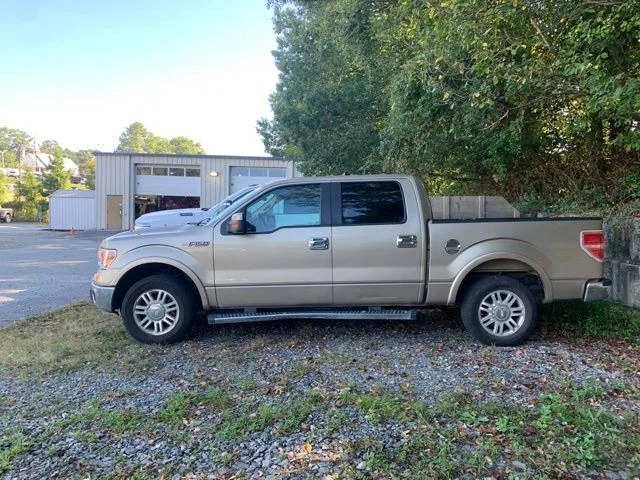 Used 2013 Gold Ford Lariat image 5