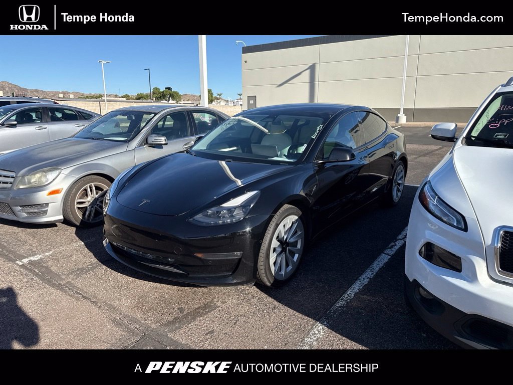 Used 2021 Solid Black Tesla Long Range image 1