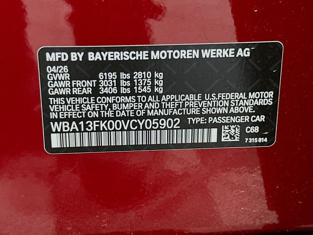 New 2027 Vegas Red Metallic BMW 550e xDrive image 24