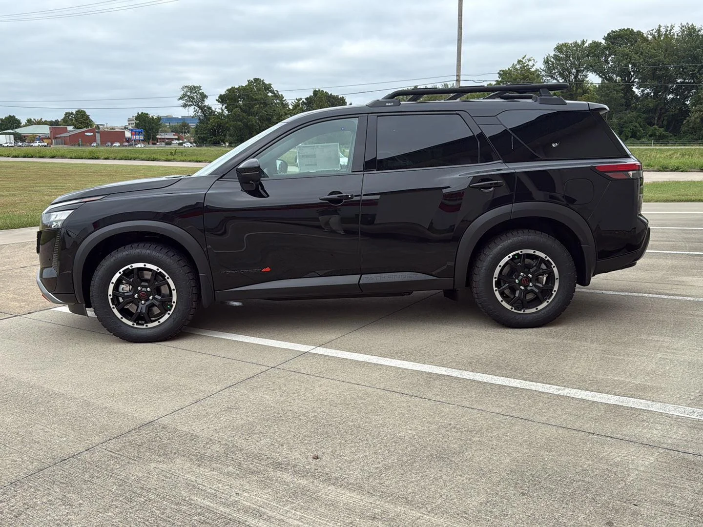 New 2026 Super Black Nissan Rock Creek image 4