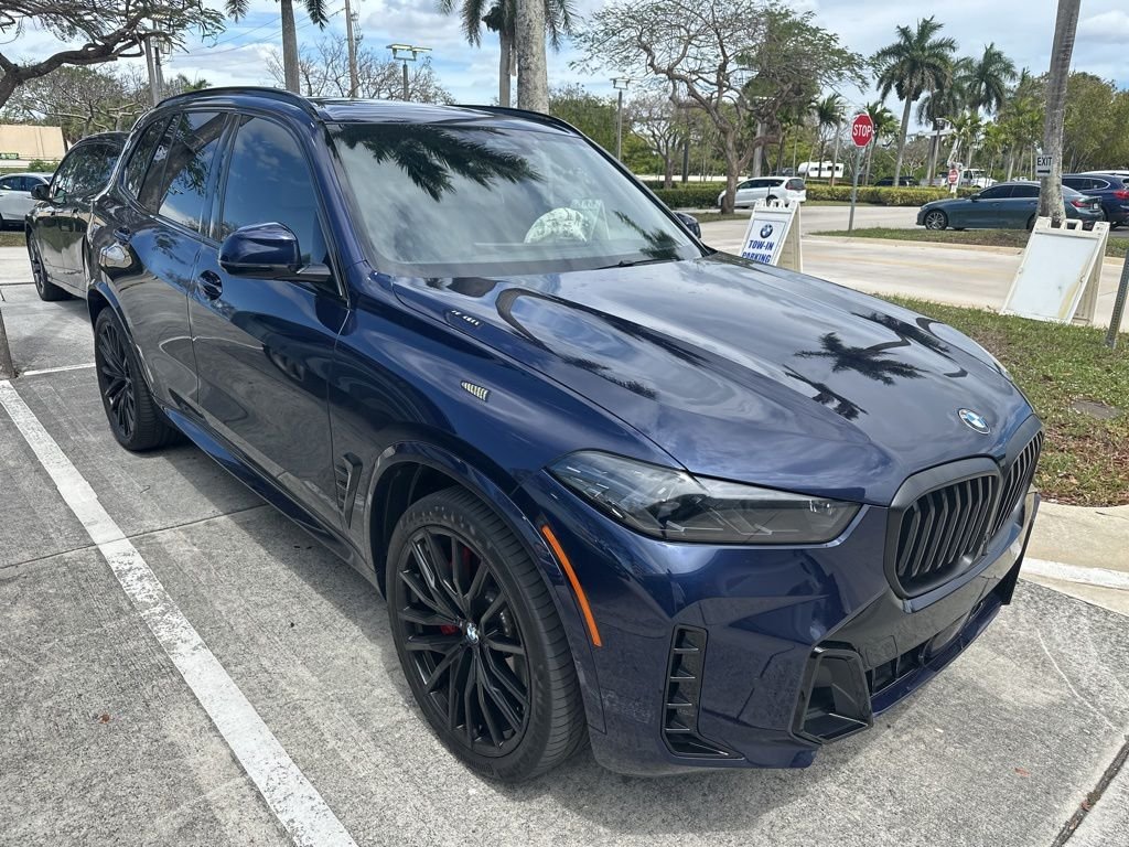 Certified Used 2024 Tanzanite Blue II Metallic BMW sDrive40i image 4
