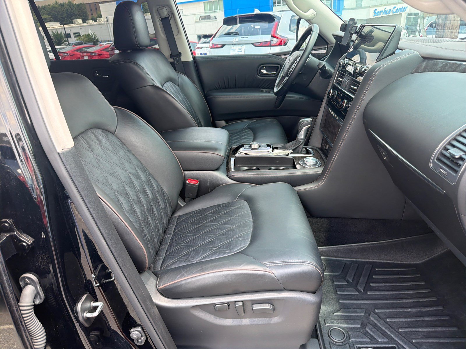 Used 2024 Super Black Nissan Platinum image 13