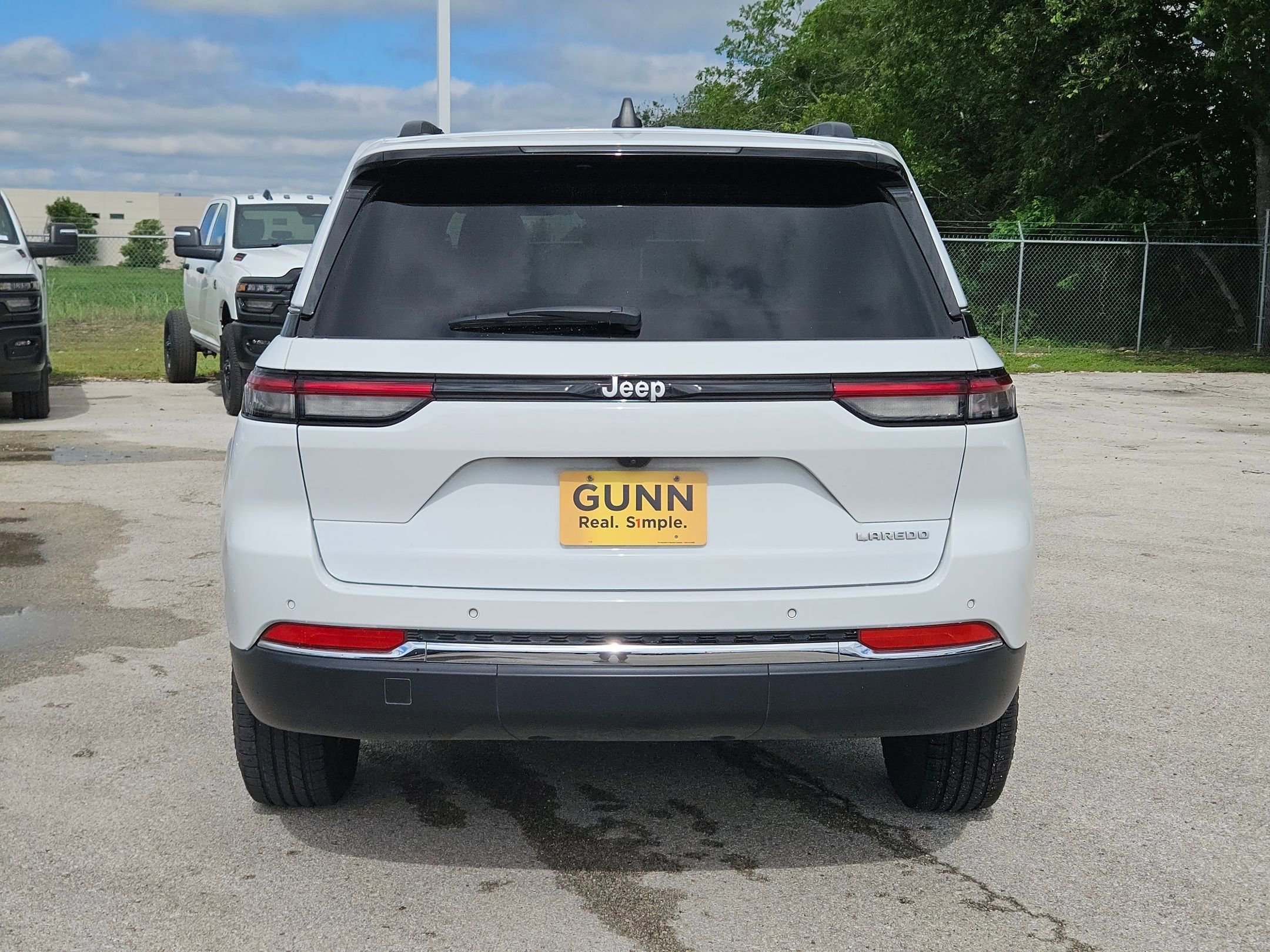 Used 2024 Bright White Clearcoat Jeep Laredo A image 4