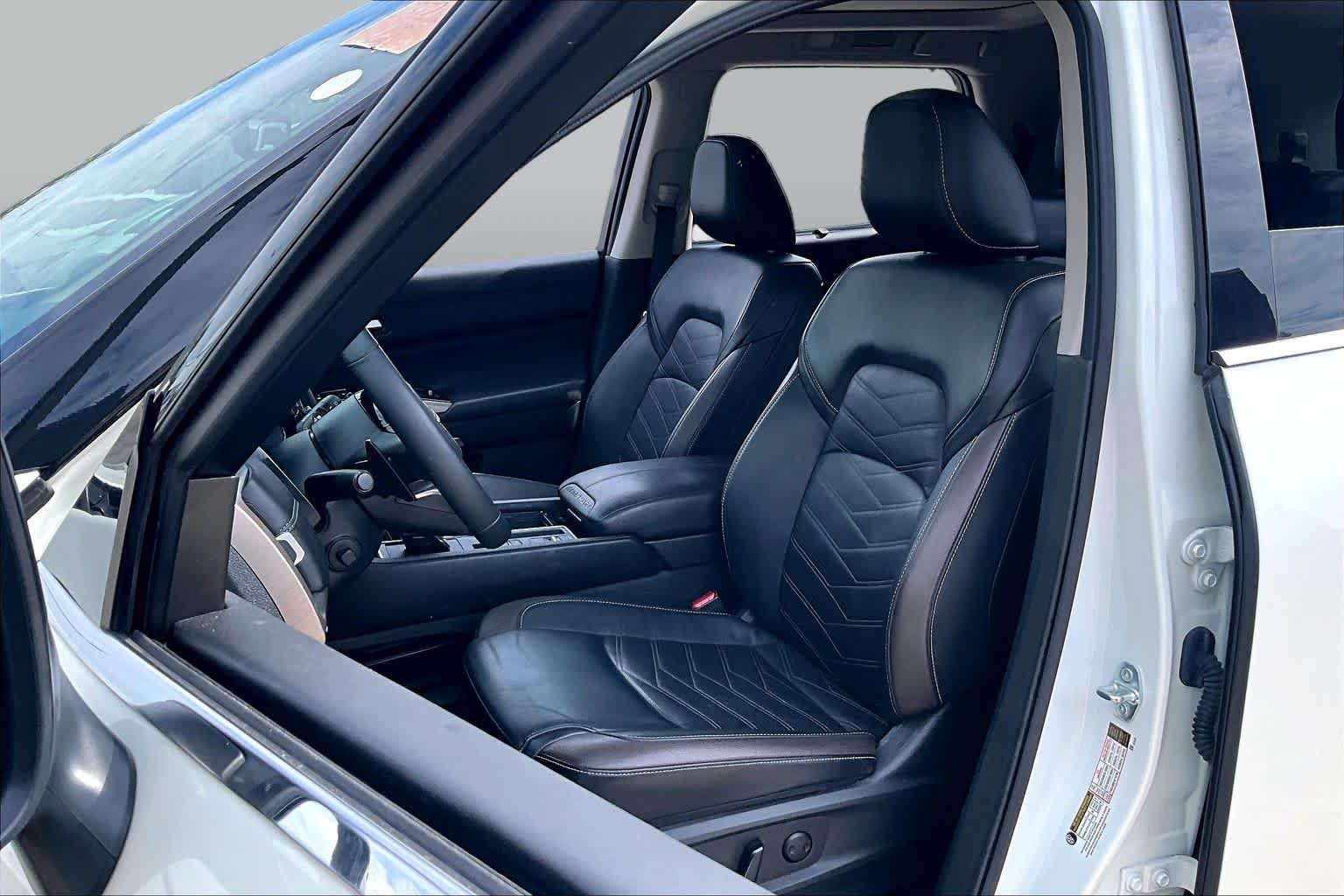 Used 2024 Pearl White Tricoat/Super Black Nissan Platinum image 8