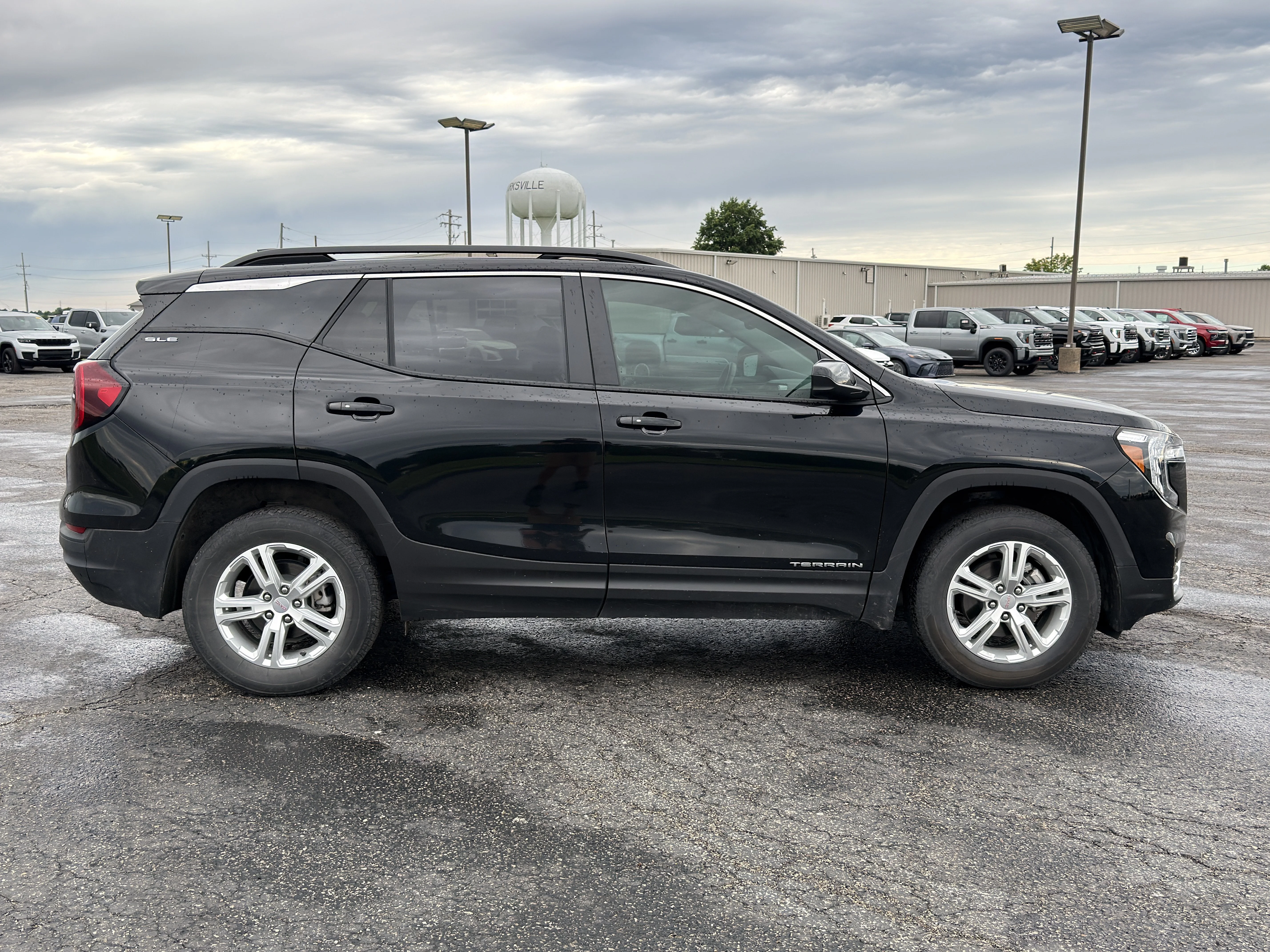 Used 2024 Ebony Twilight Metallic GMC SLE image 2