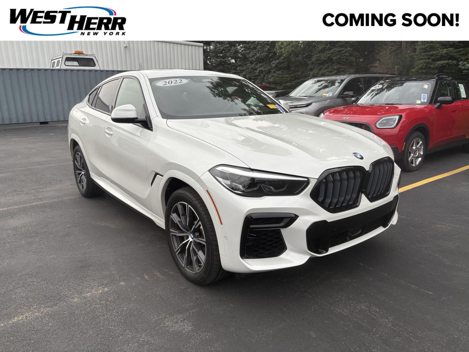 Used 2022 Mineral White Metallic BMW xDrive40i image 1