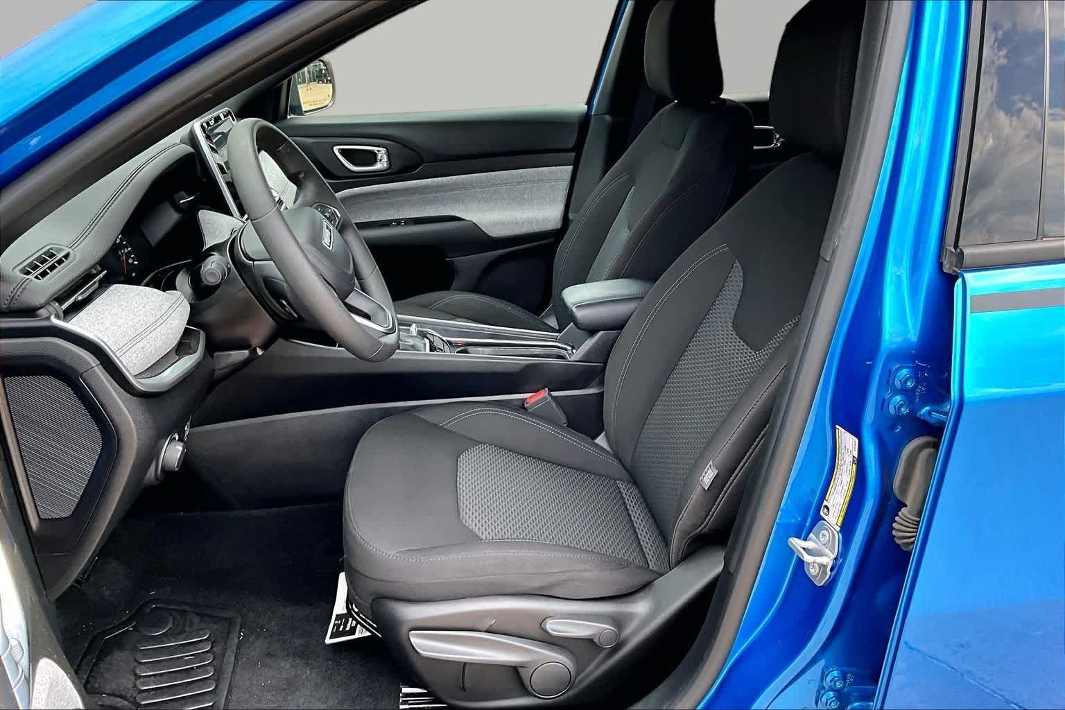 Used 2025 Hydro Blue Pearlcoat Jeep Sport image 9