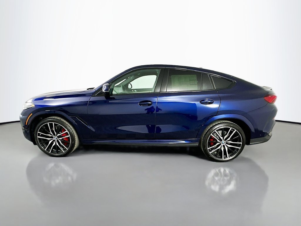 Used 2026 Tanzanite Blue II Metallic BMW xDrive40i image 8