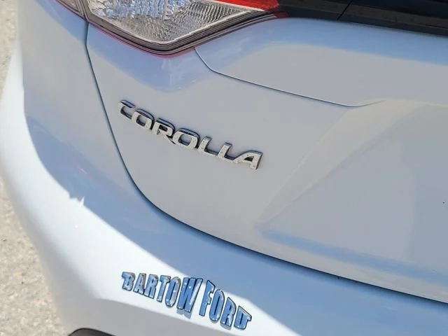Used 2024 White Toyota LE image 9